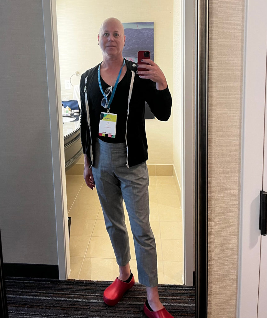 D.J. selfie in hotel wearing WCUS badge